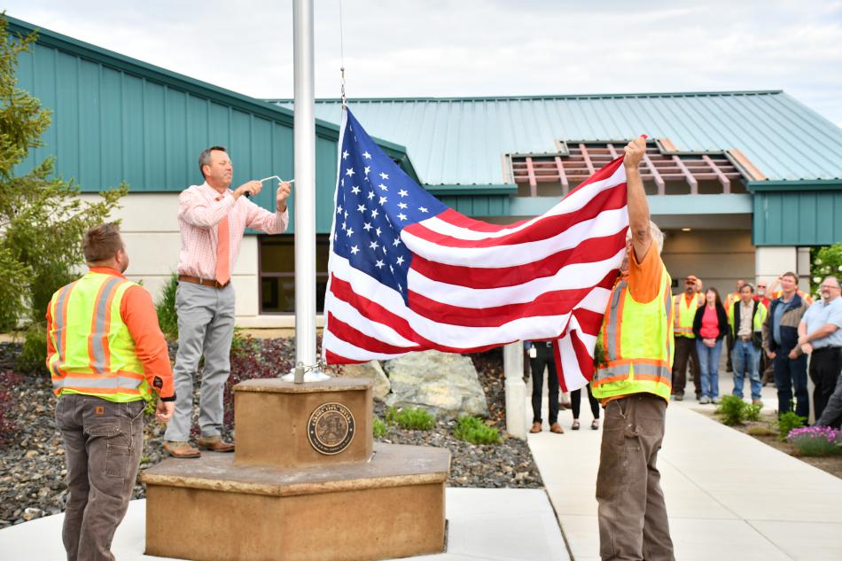 Carson City Public Works members gathered Wednesday in front of the new flag pole.