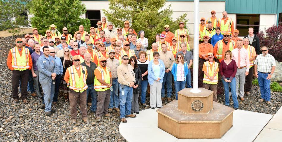 The department at the Public Works facility pose for a group photo.