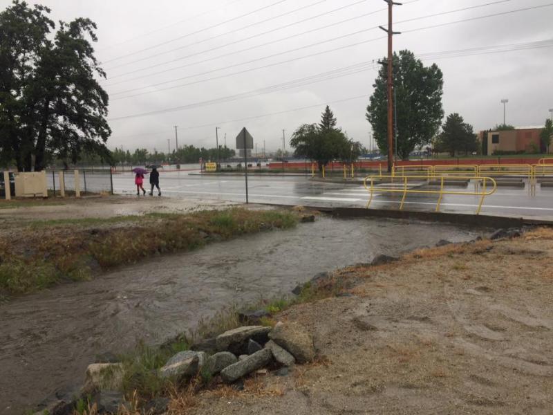 Drainages were running high this morning at Mills Park and in front of Carson High School.