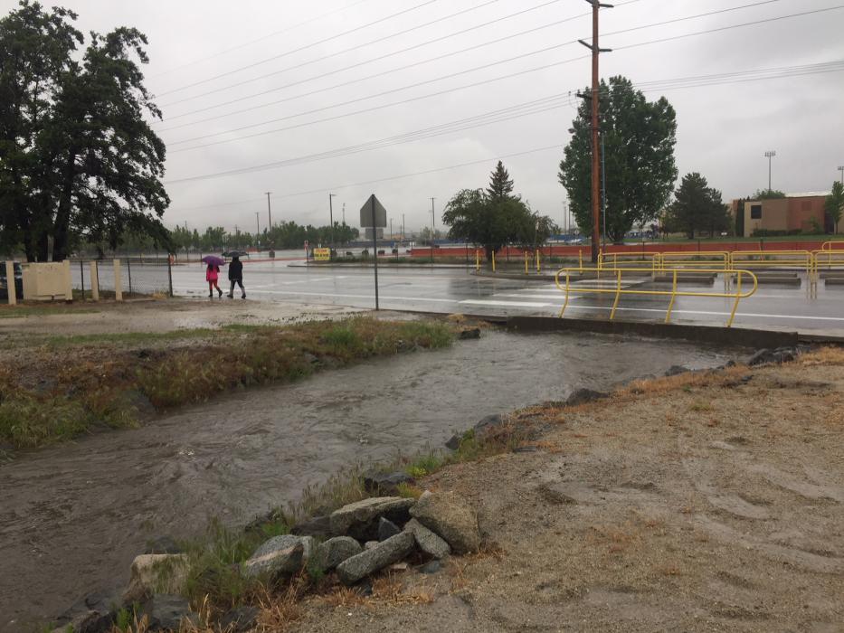 Drainages were running high this morning at Mills Park and in front of Carson High School.