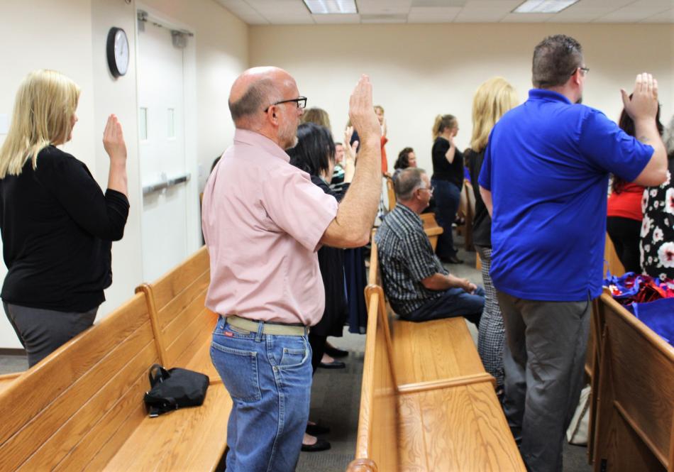 Carson City CASA volunteers stand to take the oath Wednesday.