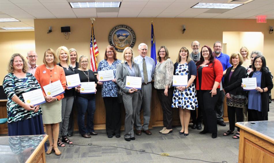Carson City CASA volunteers stand with court officials Wednesday.