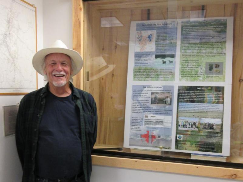 Archaeologist Dr. Robert Elston with the display he created.