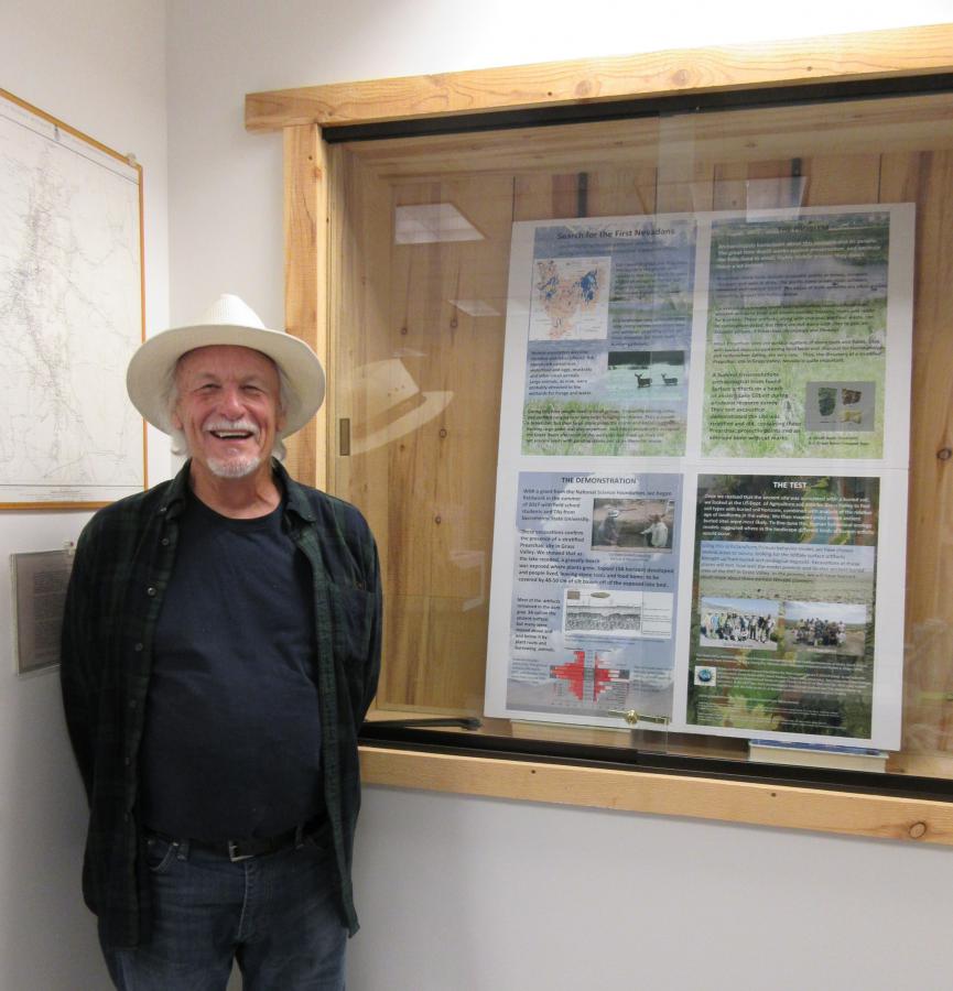 Archaeologist Dr. Robert Elston with the display he created.