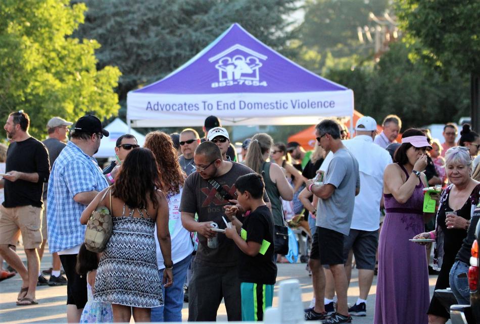 Advocates to End Domestic Violence booth set up during the 2017 Taste of Downtown.