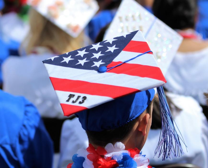A graduate's mortarboard bears the initials of Timothy Jones, Jr.
