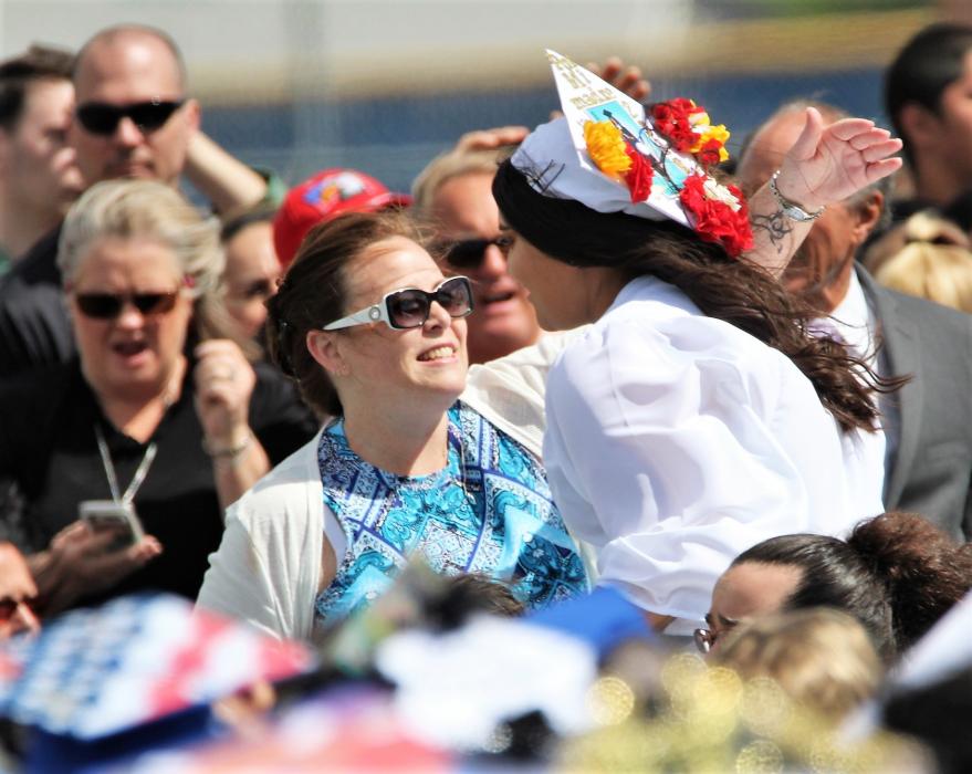 CHS Principal Tasha Fuson embraces a graduate Saturday.