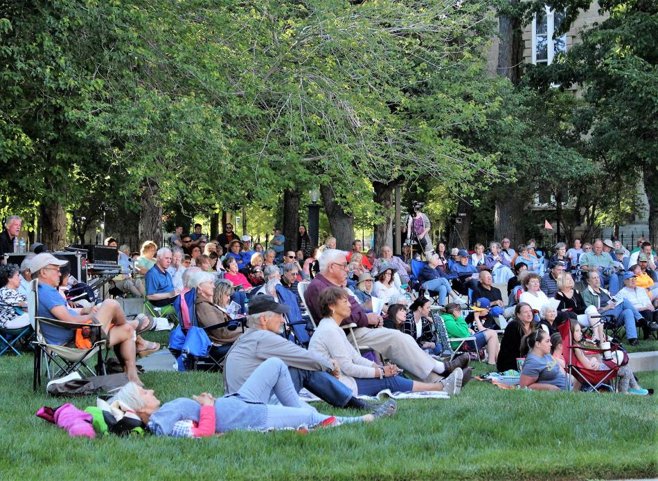 Guests on the lawn surrounding the Capital Amphitheater.
