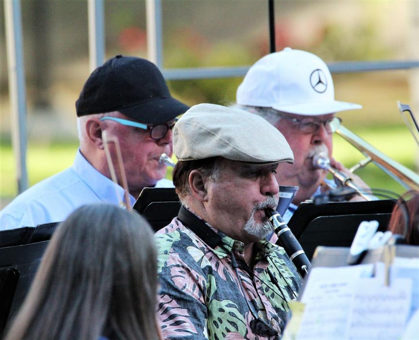 A clarinet and brass players.