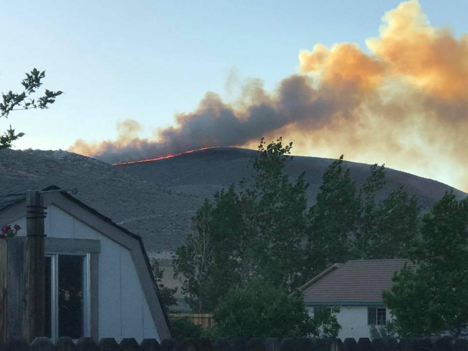 The fire in Voltaire Canyon is moving rapidly and quite visible in Carson City. Photo by Raquel Fulghum