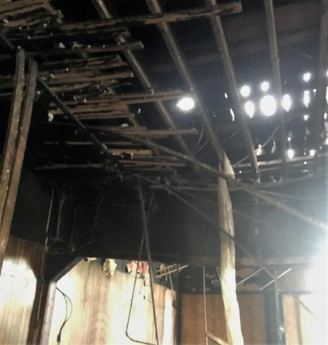 Photo courtesy NBA. Collapsed roof of the Jack's Bar building.