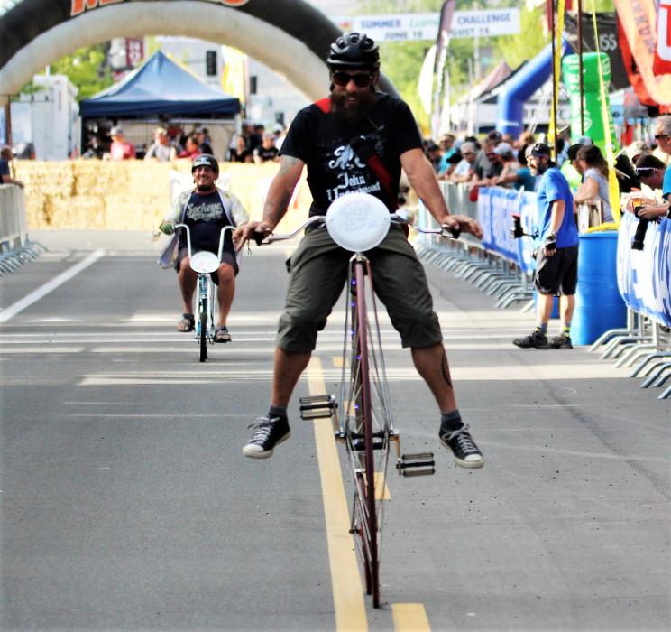 A big wheel rider finishes Friday's Clunker Criterium.