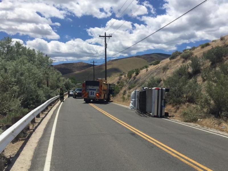 South Curry Street remains closed this afternoon due to a vehicle rollover.