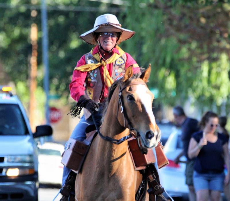 Photos by Brett Fisher. A Pony Express rider arrives at the exchange at Second and Curry streets.