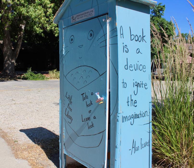 Photo by Brett Fisher. Japanese anime design on the W. Washington St. book box.