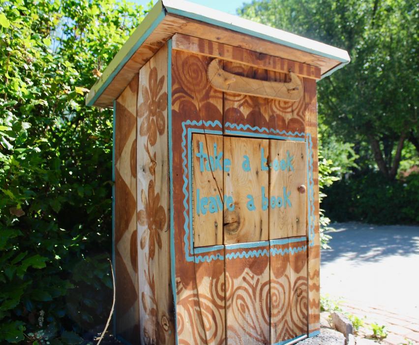 Photo by Brett Fisher. Book box on Telegraph near Iris and Mountain streets.