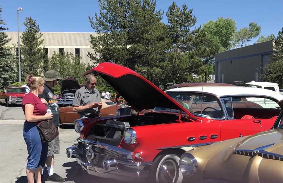 Car enthusiasts took note of a displayed engine.