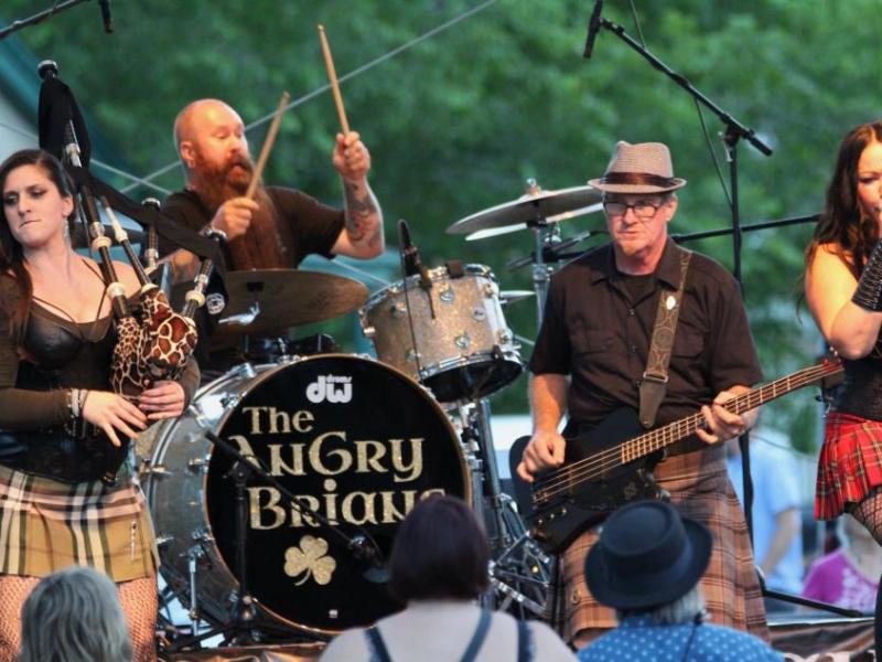 Photos by Brett Fisher. The Angry Brians rock the Minnesota Street stage Saturday night.