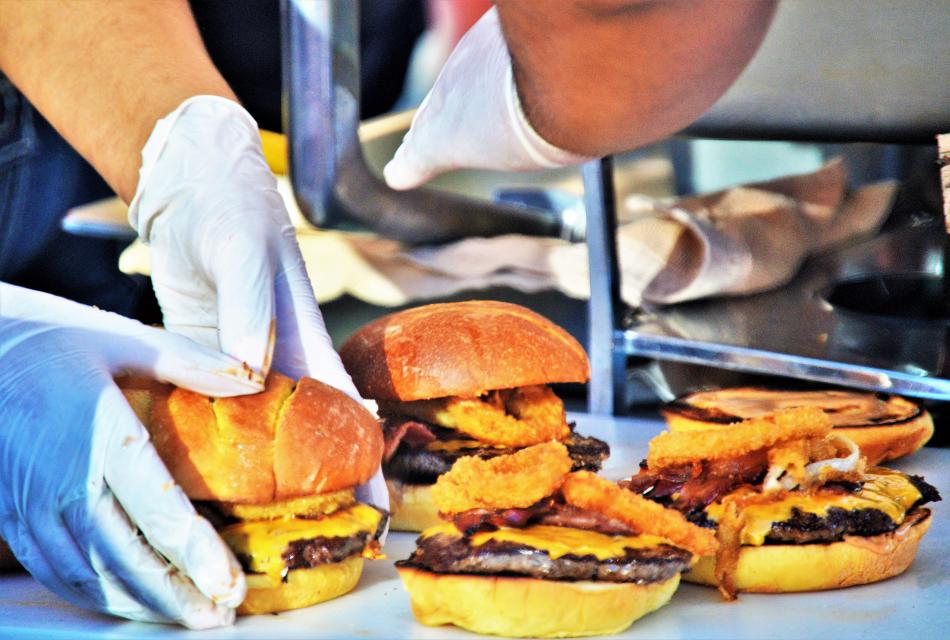 Cheeseburgers prepared at the 2016 Taste of Downtown.