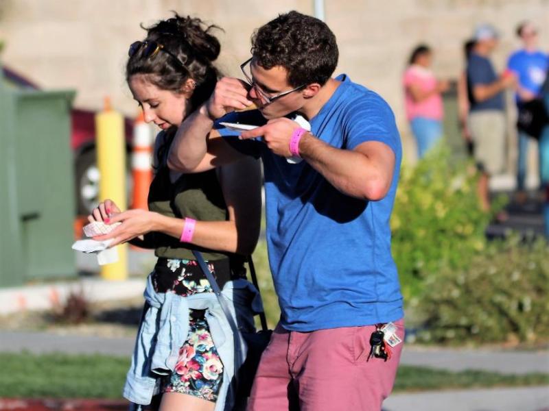 Photos by Brett Fisher. A couple enjoys the 2017 Taste of Downtown.