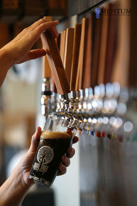 Bartender Beth Harrison works at the Shoe Tree Brewing Co. in Carson City. Photo: Cathleen Allison, Nevada Momentum