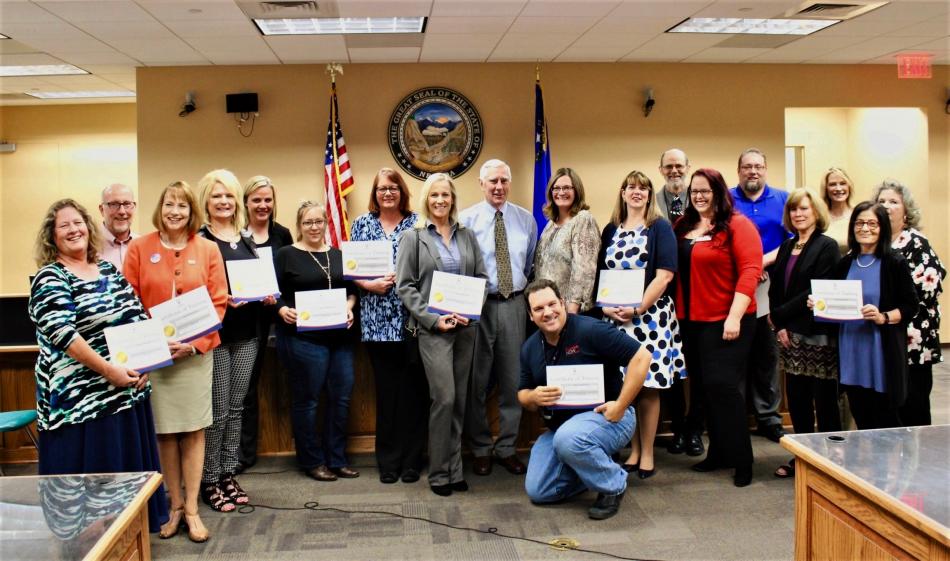 CASA volunteers and court officials pose during a May 30 swearing in ceremony at the Carson City Courthouse.