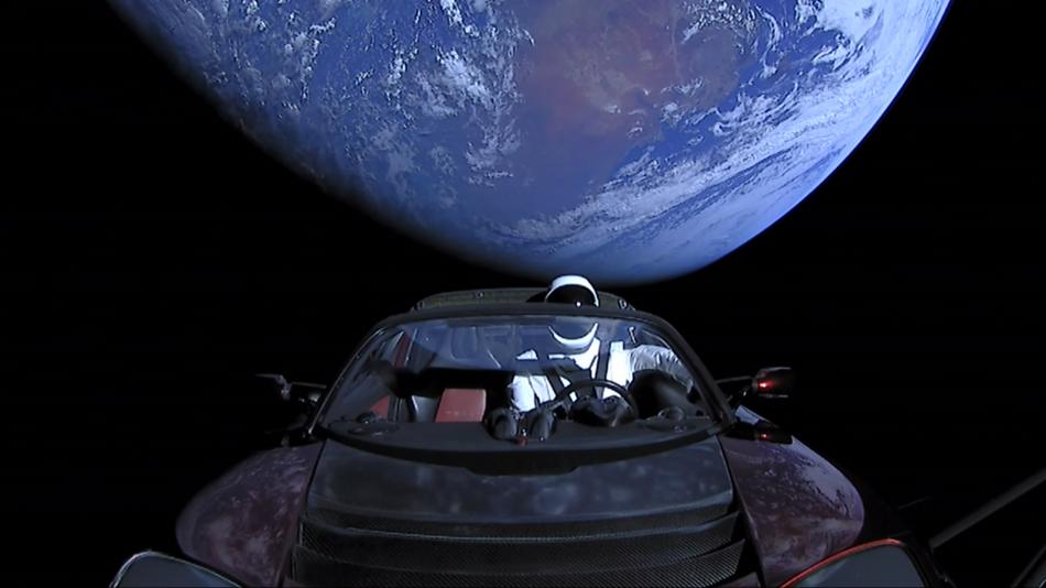Tesla Roadster, with Earth in background. 