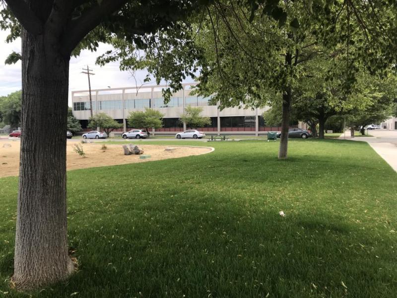 The new park features grassy, shaded areas.