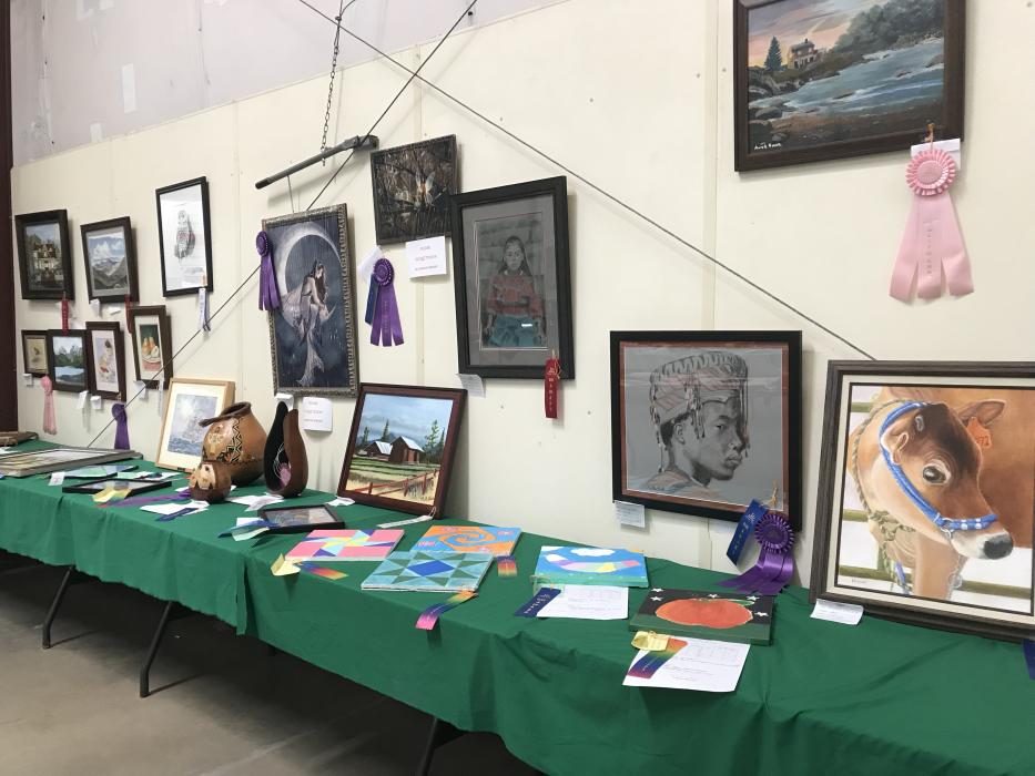 Make sure to stop by the art exhibit inside the air conditioning.
