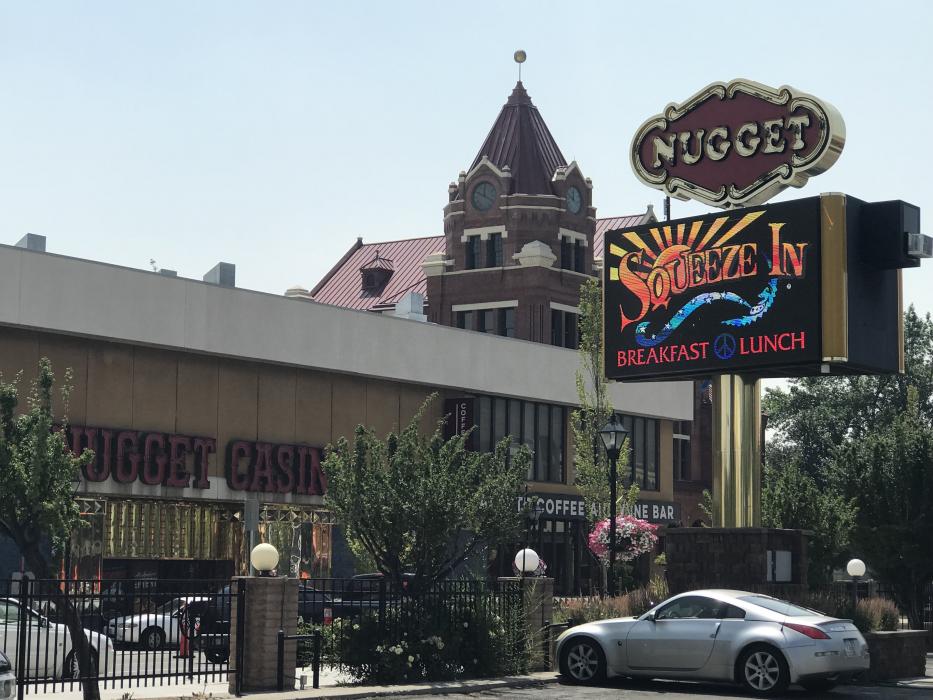 The billboard across from the Carson Nugget announces the new Squeeze In.
