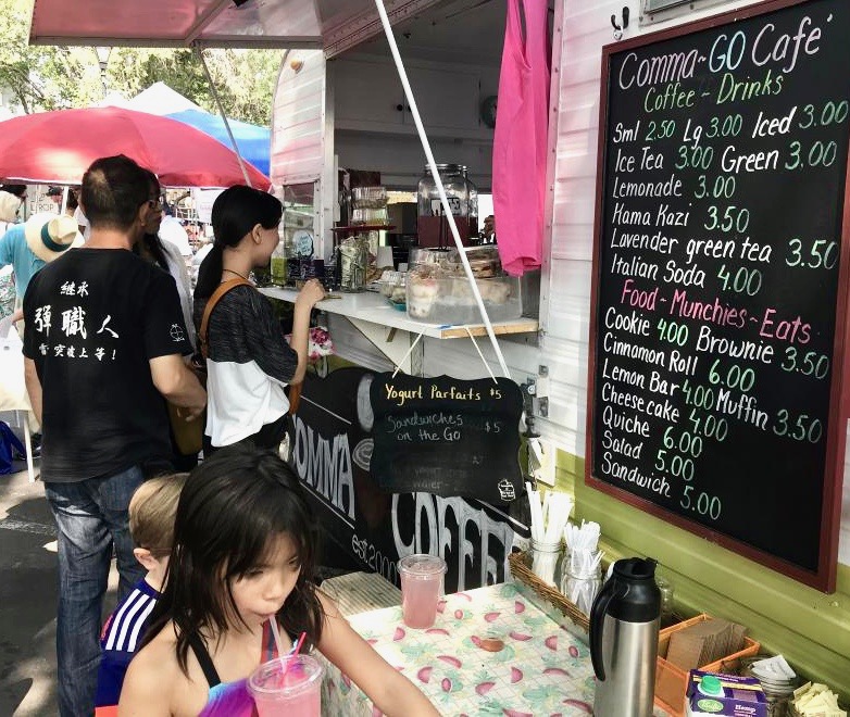 Small businesses like Comma Coffee join in on community efforts during the weekly market downtown.