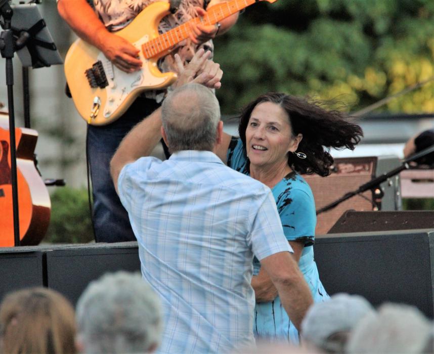 Photo by Brett Fisher. A couple twirls as they dance during a song by the Trippin' King Snakes Saturday at the BAC.