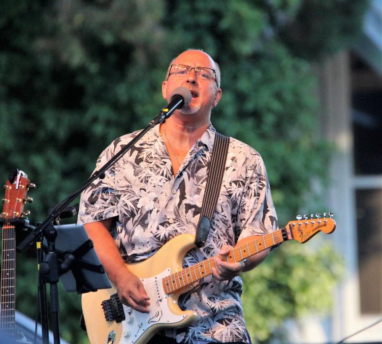 Photo by Brett Fisher. Guitarist Ev Musselman of the Trippin' King Snakes also provided vocals Saturday.