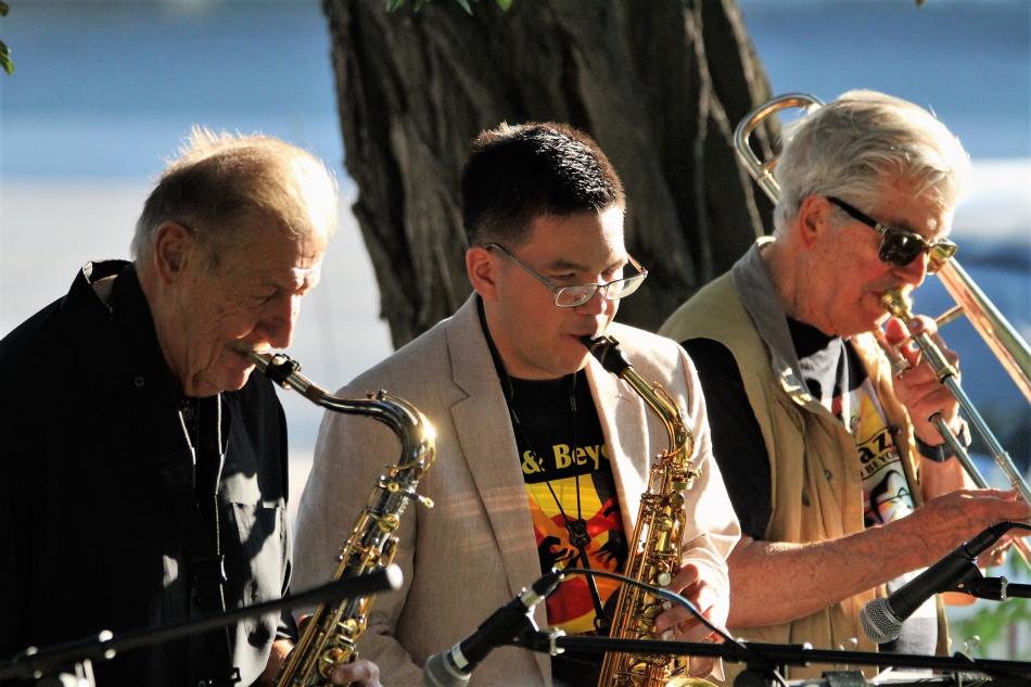 Photo by Brett Fisher. The Millennium Bugs belt out some jazz at the Foreman-Roberts House Saturday.