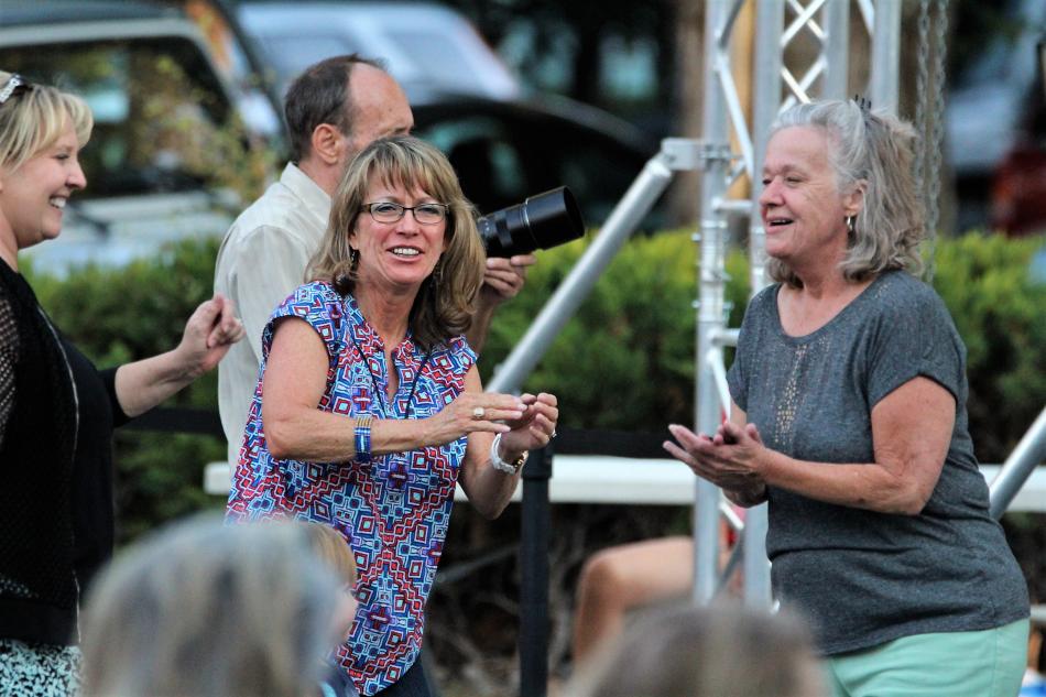 Photo by Brett Fisher. Dancers jam to the Trippin' King Snakes Saturday at the BAC.