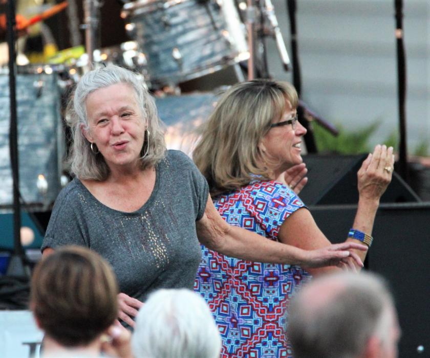 Photo by Brett Fisher. Dancers jam to the Trippin' King Snakes Saturday at the BAC.