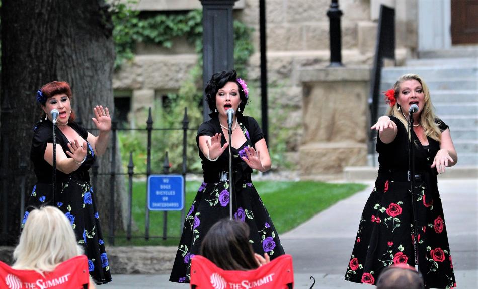 The Retro Radio Dolls next to the Nevada State Capitol Building Sunday.