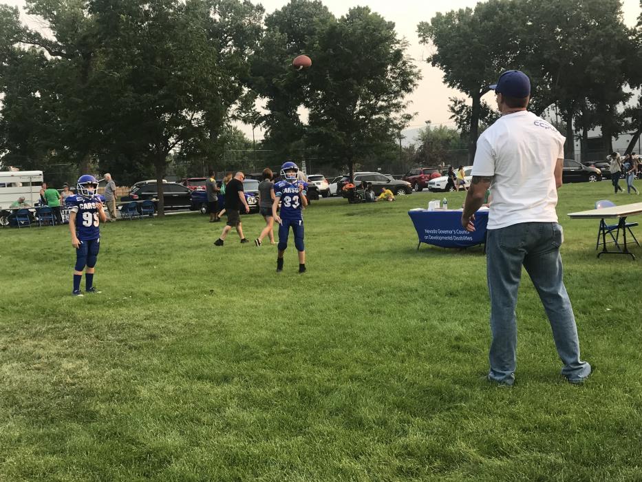 A couple of Carson City football stars throw the ball around.