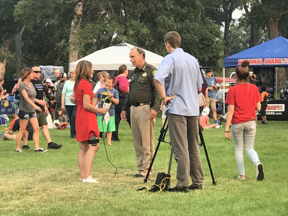Sheriff Kenny Furlong prepares for a news interview.