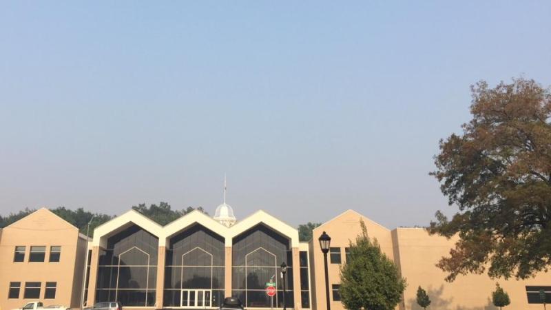The foothills behind the capital building were obscured due to thick smoke.