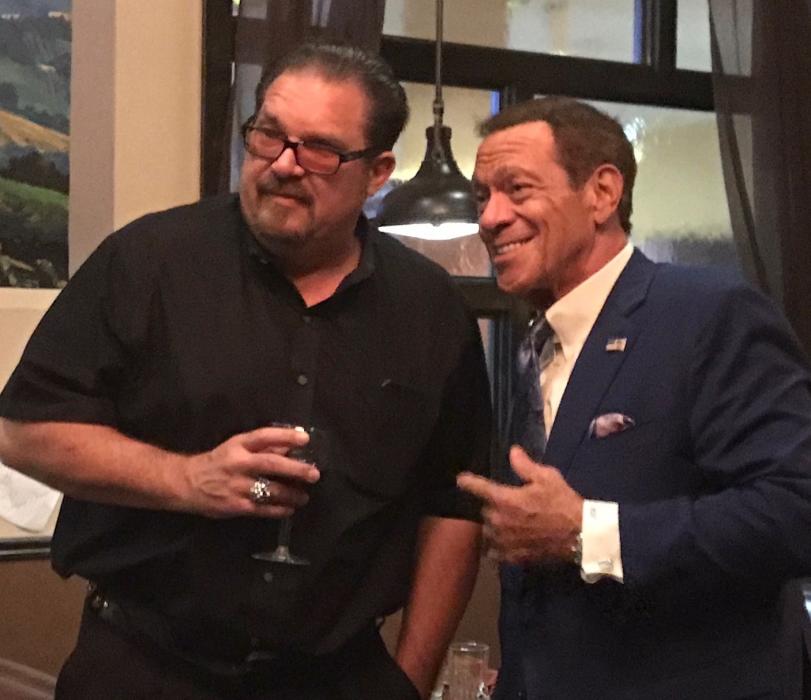 An extra on the film crew with star Joe Piscopo at a meet and greet Thursday. Photo by In Plain Sight Marketing