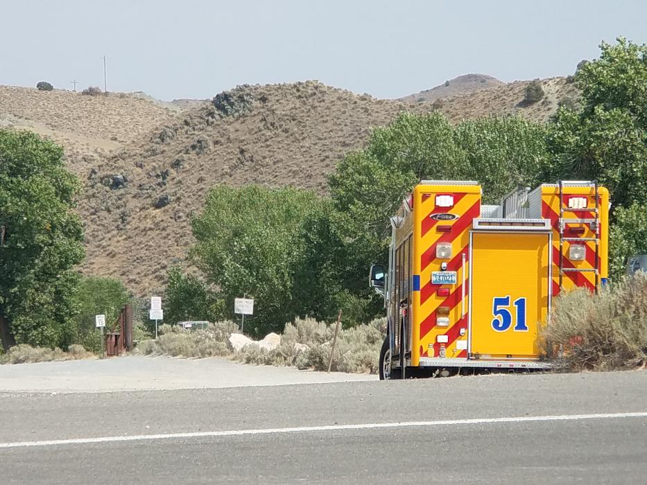 Photo by Brett Fisher. A CCFD engine is staged at the entrance to Brunswick Canyon Rd.