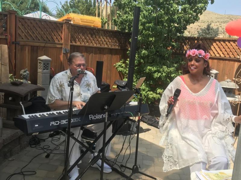 Jakki Ford, a jazz stylist, played towards the front of the garden venue with her accompanying pianist.