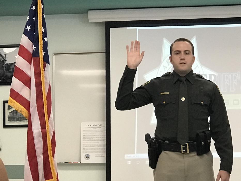 Christopher Wolken was sworn in as a Uniformed Reserve Deputy.