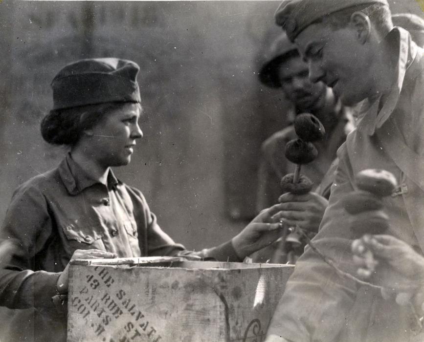 A Salvation Army Doughnut girl serves an American GI during World War I in France. Photo courtesy of Nevada State Museum