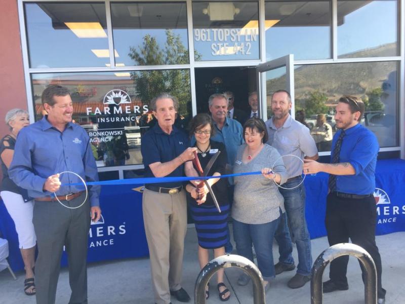 A ribbon cutting ceremony opens the new Farmer’s location. Photo by Jenny Treece.
