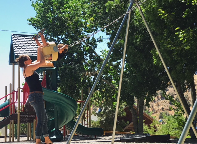 A mother and son enjoy a day at the park. The forecast this holiday weekend calls for a warming trend. Photo by Kelsey Penrose