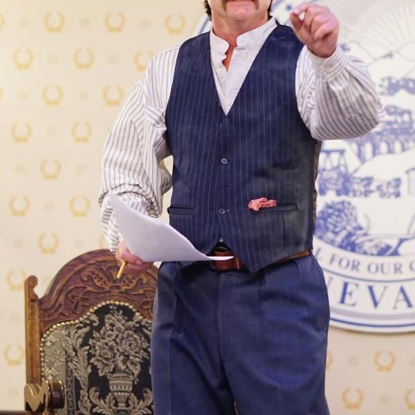 Nevada State Museum Director Myron Freedman as John Millain