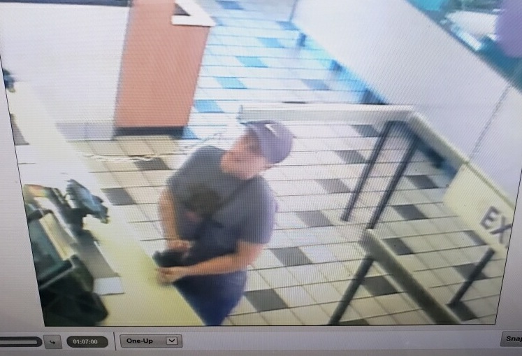 The suspects were seen using stolen credit cards at two fast food restaurants on Sunday.