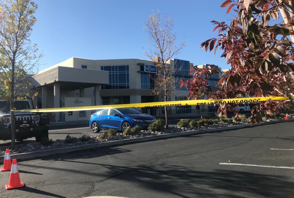 Caution tape was placed in the parking lots to keep people and motorists from the parking lot.